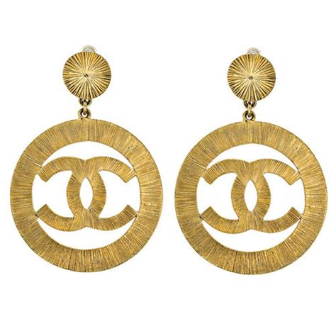 chanel gold dangle earrings replica|Chanel dangle earrings for sale.